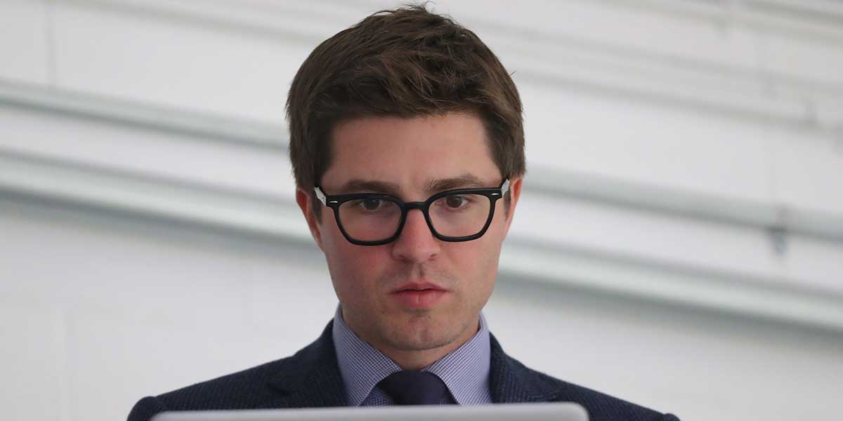 Toronto Maple Leafs general manager Kyle Dubas on his laptop before the start of their game against the Ottawa Senators at Lucan Community Memorial Centre. The Maple Leafs beat the Senators 4-1.