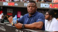 MLB hall of fame outfielder Ken Griffey Jr. in the dugout during the HBCU Classic between the American League and National League at Truist Park.