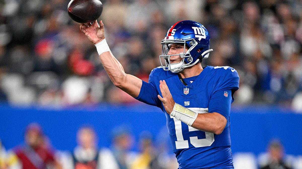 New York Giants quarterback Tommy DeVito (15) throws the ball during the third quarter against the New England Patriots at MetLife Stadium.