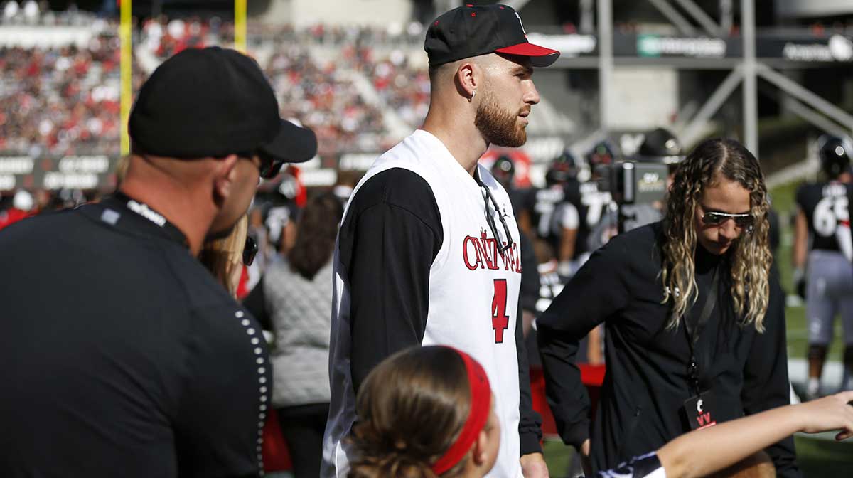 Former UC tight end Travis Kelce walks on the sidelines before the first quarter of the game between the Cincinnati Bearcats and the Tulsa Golden Hurricane at Nippert Stadium on Oct. 19, 2019. © Sam Greene/The Enquirer / USA TODAY NETWORK via Imagn Images