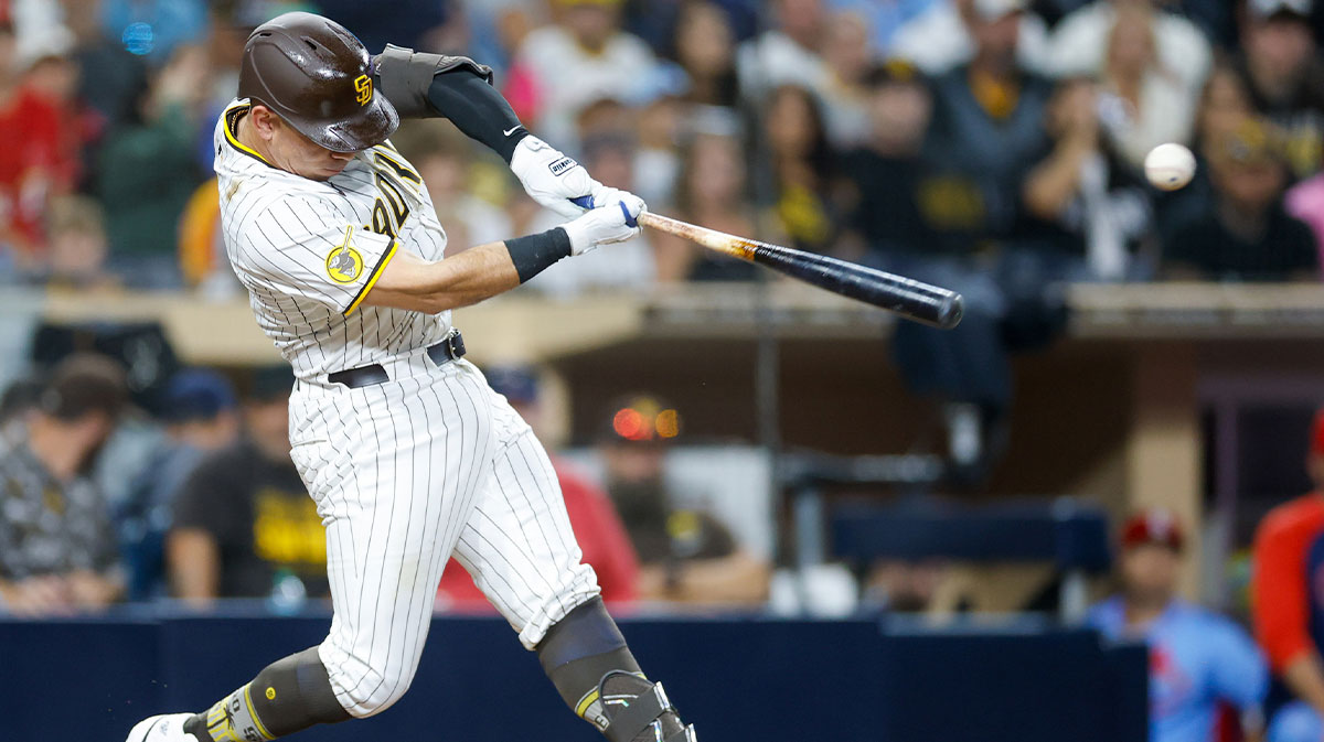 Aug 2, 2025; San Diego, California, USA; San Diego Padres catcher Freddy Fermin (54) hits a rbi single during the ninth inning against the St. Louis Cardinals at Petco Park. 