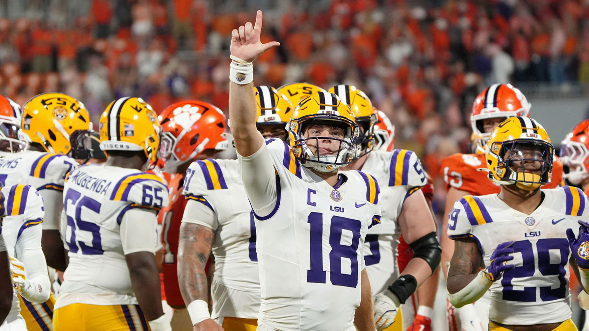 LSU Tigers quarterback Garrett Nussmeier (13) gestures after a play against the Clemson Tigers at Memorial Stadium.