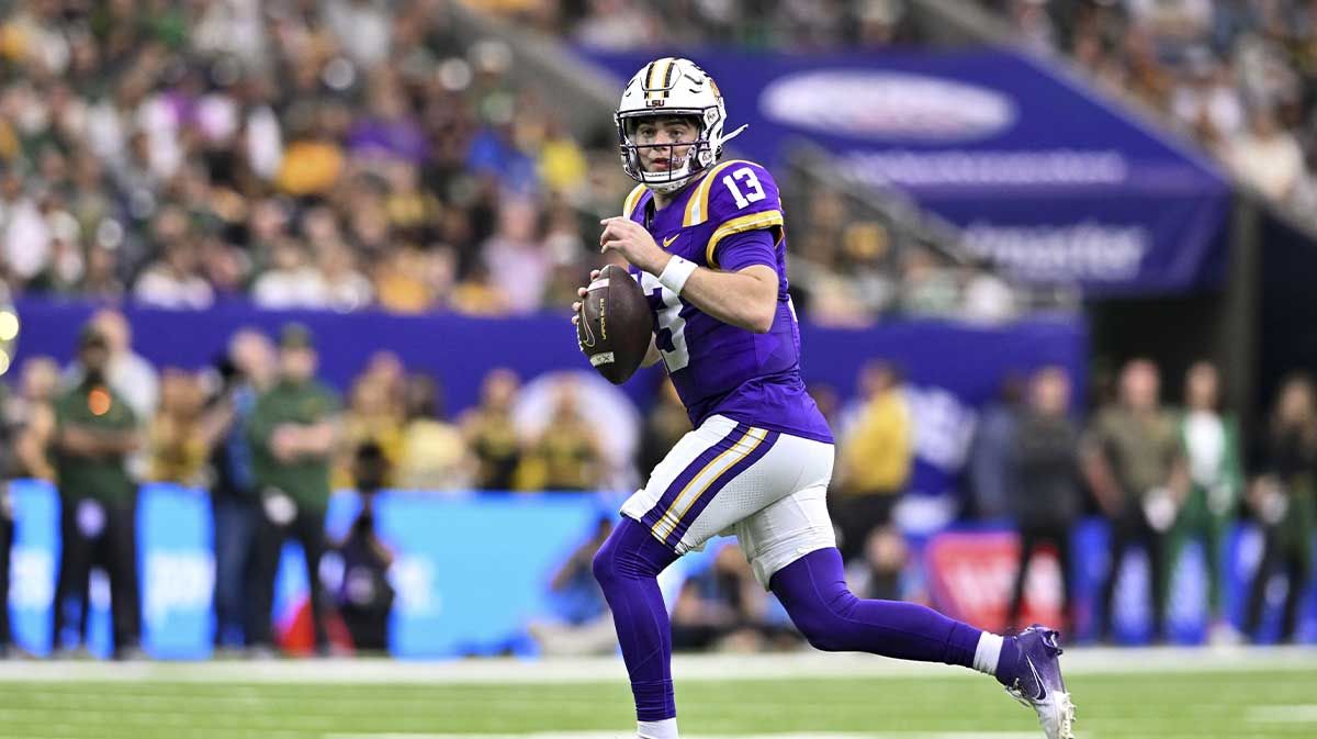 LSU Tigers quarterback Garrett Nussmeier (13) runs the ball during the first half against the Baylor Bears at NRG Stadium.