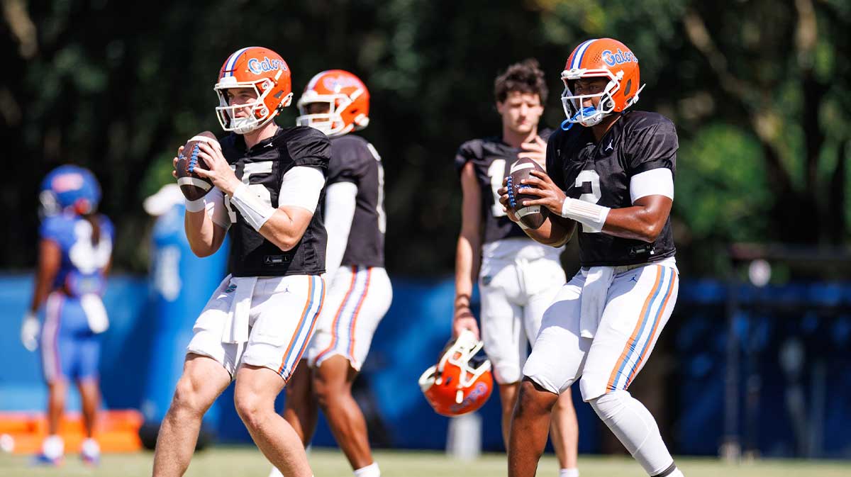 Florida Gators quarterback Harrison Bailey (15) and Florida Gators quarterback DJ Lagway (2) run a play during fall football practice at Heavener Football Complex at the University of Florida in Gainesville, FL on Tuesday, August 12, 2025.