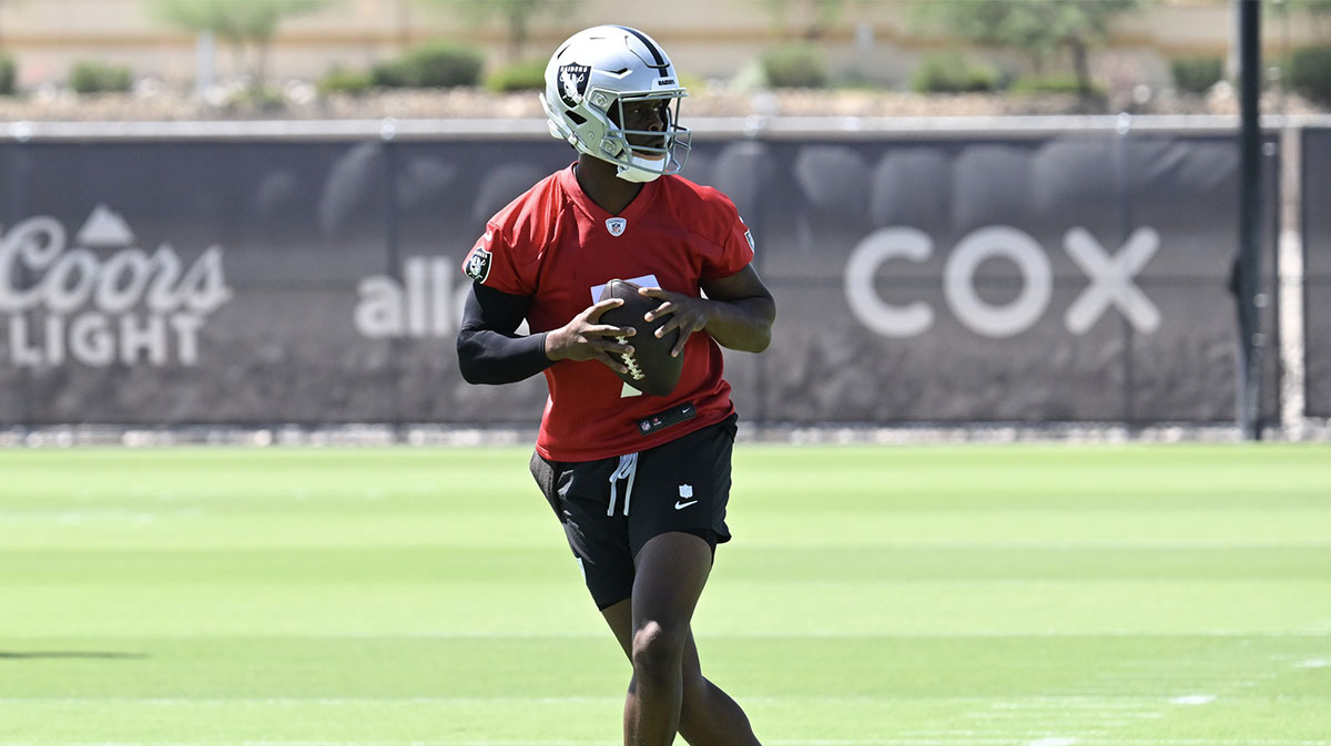 Las Vegas Raiders quarterback Geno Smith (7) runs through a drill during Las Vegas Raiders Minicamp at Intermountain Health Performance Center.