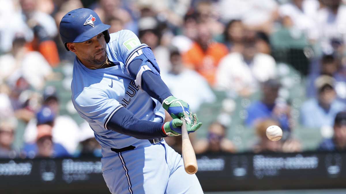 Toronto Blue Jays outfielder George Springer (4) hits a single in the third inning against the Detroit Tigers at Comerica Park