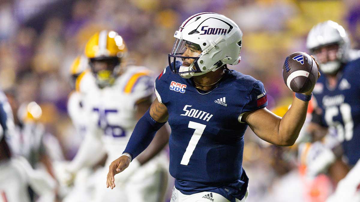 South Alabama Jaguars quarterback Gio Lopez (7) rolls out against the LSU Tigers during the second quarter at Tiger Stadium.