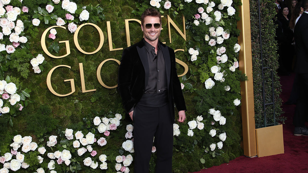 Texas Longhorns football fan Glen Powell at the Golden Globes.