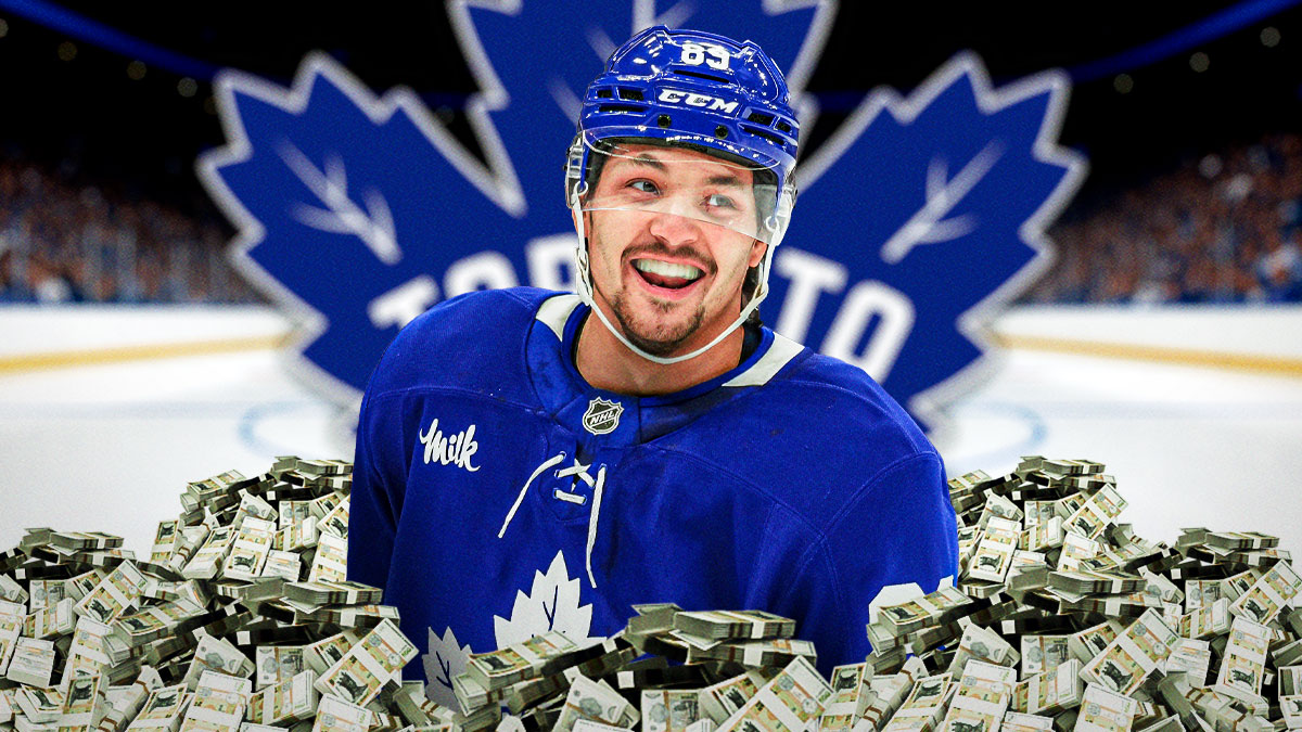 Nicholas Robertson with money around him and maple leafs logo in the background.