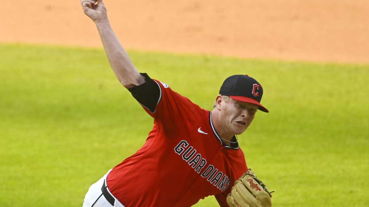 Cleveland Guardians relief pitcher Nic Enright (59) delivers a pitch in the eighth inning against the Minnesota Twins at Progressive Field.