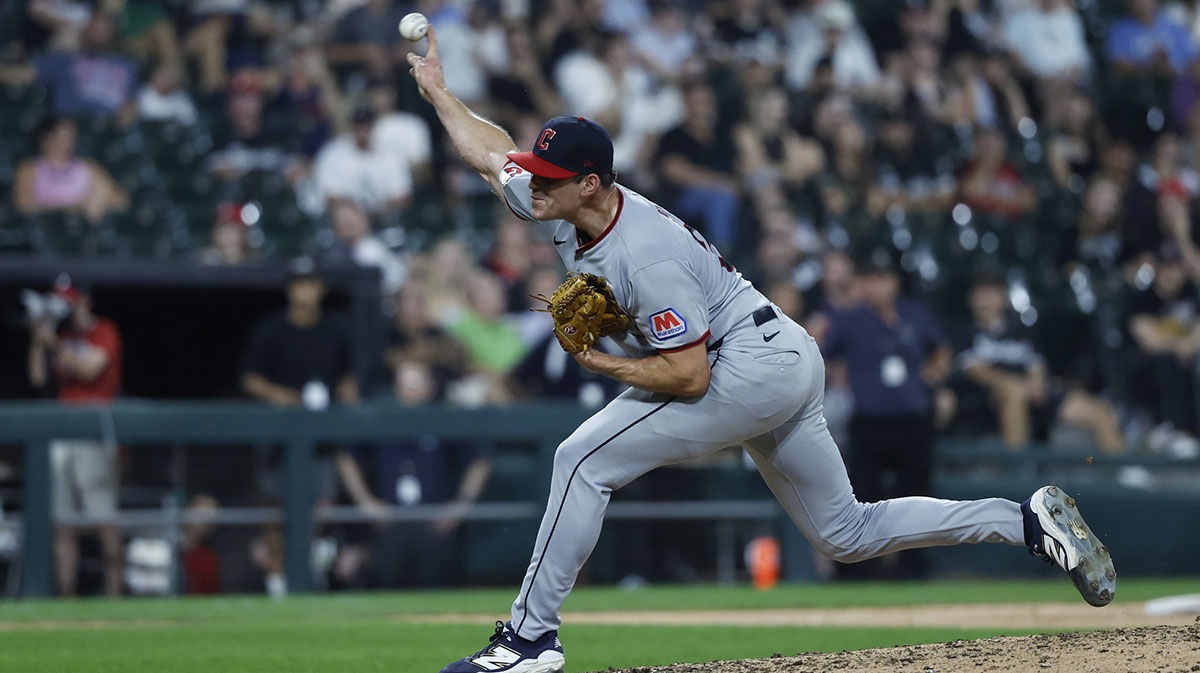 Cleveland Guardians relief pitcher Cade Smith (36) delivers a pitch against the Chicago White Sox during the ninth inning at Rate Field. 