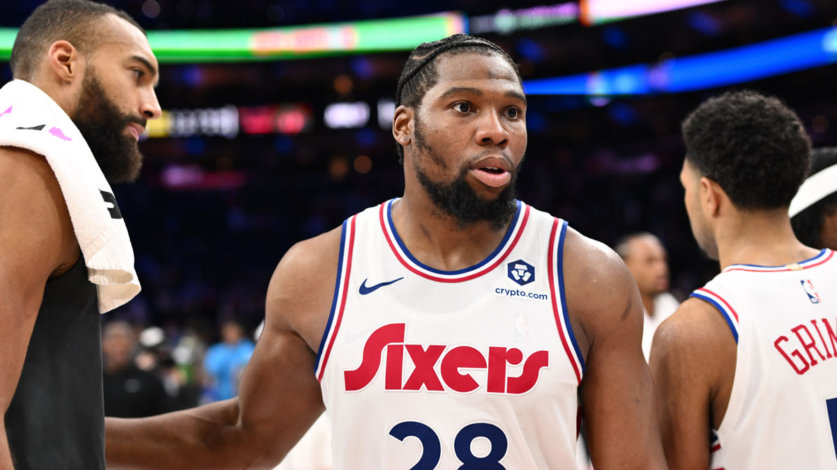 Philadelphia 76ers forward Guerschon Yabusele (28) looks on with Minnesota Timberwolves center Rudy Gobert (27) after the game at Wells Fargo Center.