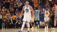 Golden State Warriors forward Gui Santos (15) reacts after the Warriors made a basket against the Memphis Grizzlies in the second quarter at the Chase Center.