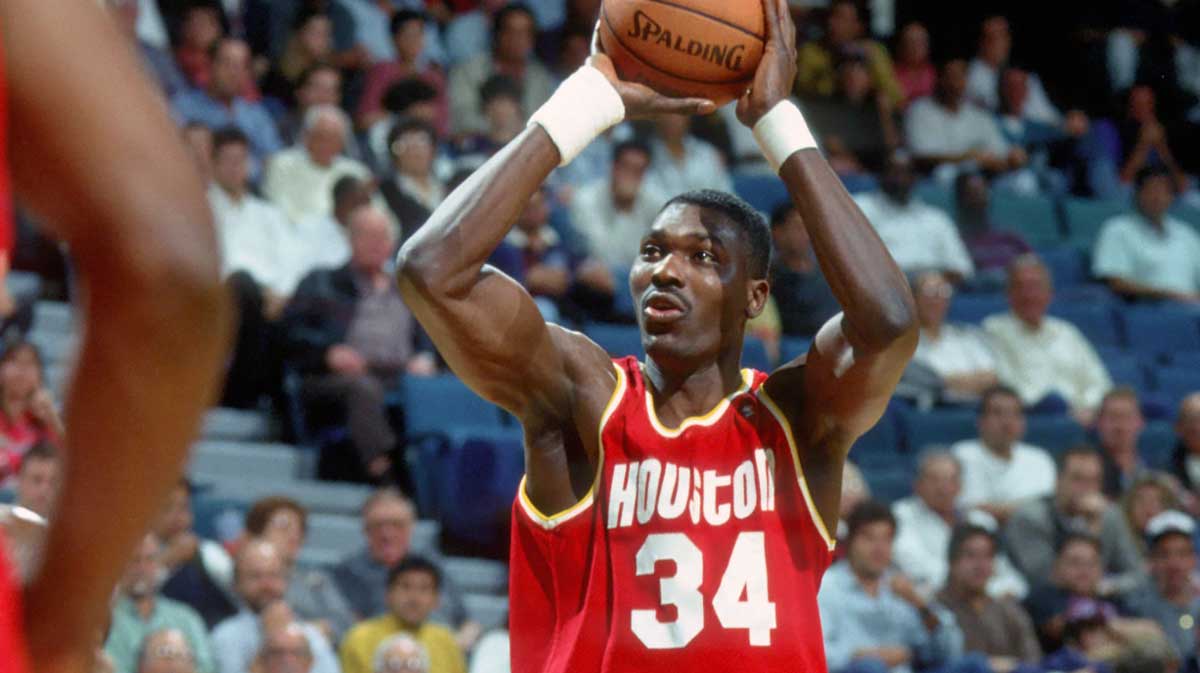 Houston Rockets center #34 HAKEEM OLAJUWON in action against the Miami Heat at the Miami Arena during the 1994-95 season.