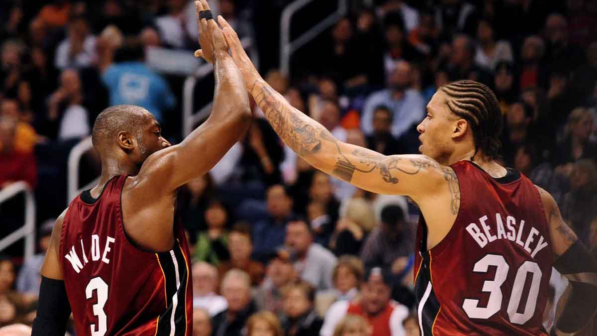 Heat guard (3) Dwayne Wade high fives forward (30) Michael Beasley against the Phoenix Suns at the US Airways Center. Miami defeated Phoenix 109-105