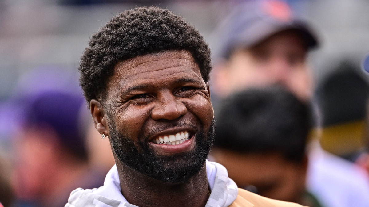 Hall of Fame former player Devin Hester looks on before the game between the Chicago Bears and Green Bay Packers at Soldier Field.