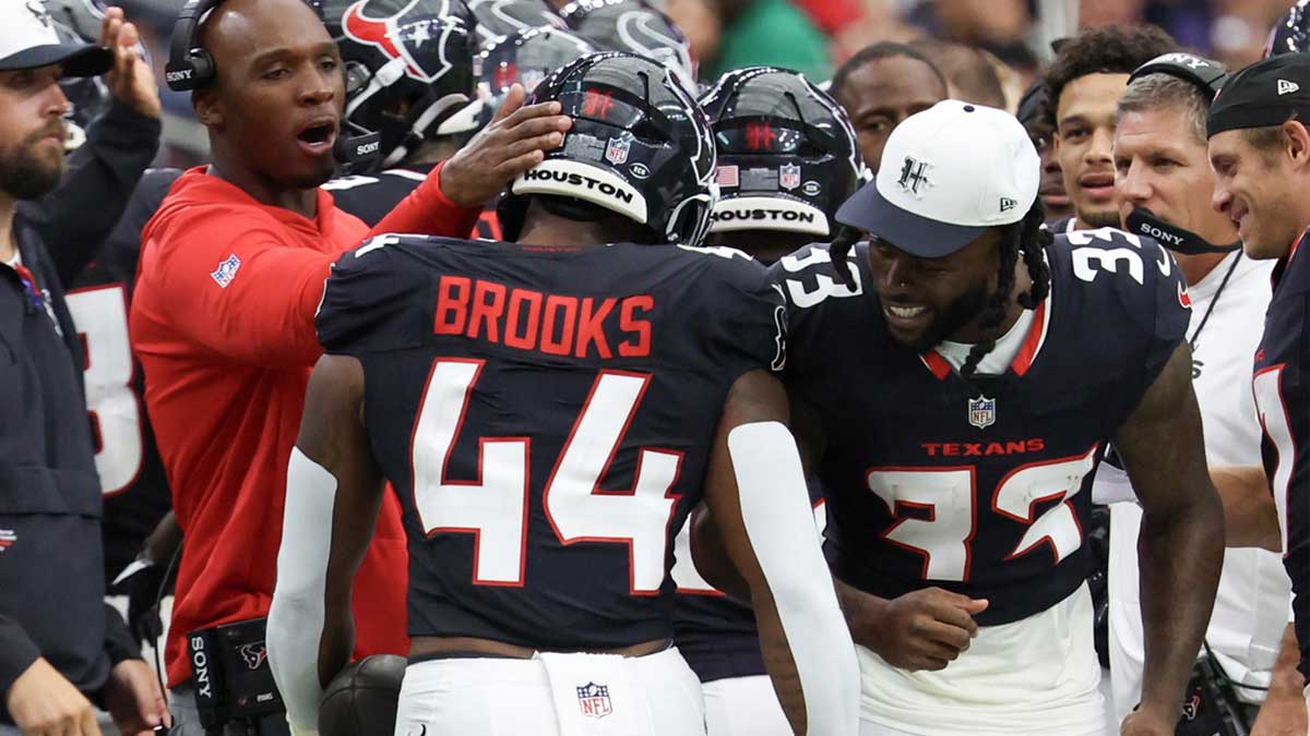 Houston Texans head coach DeMeco Ryans celebrates Houston Texans running back British Brooks (44) touchdown against the Carolina Panthers in the second half at NRG Stadium.