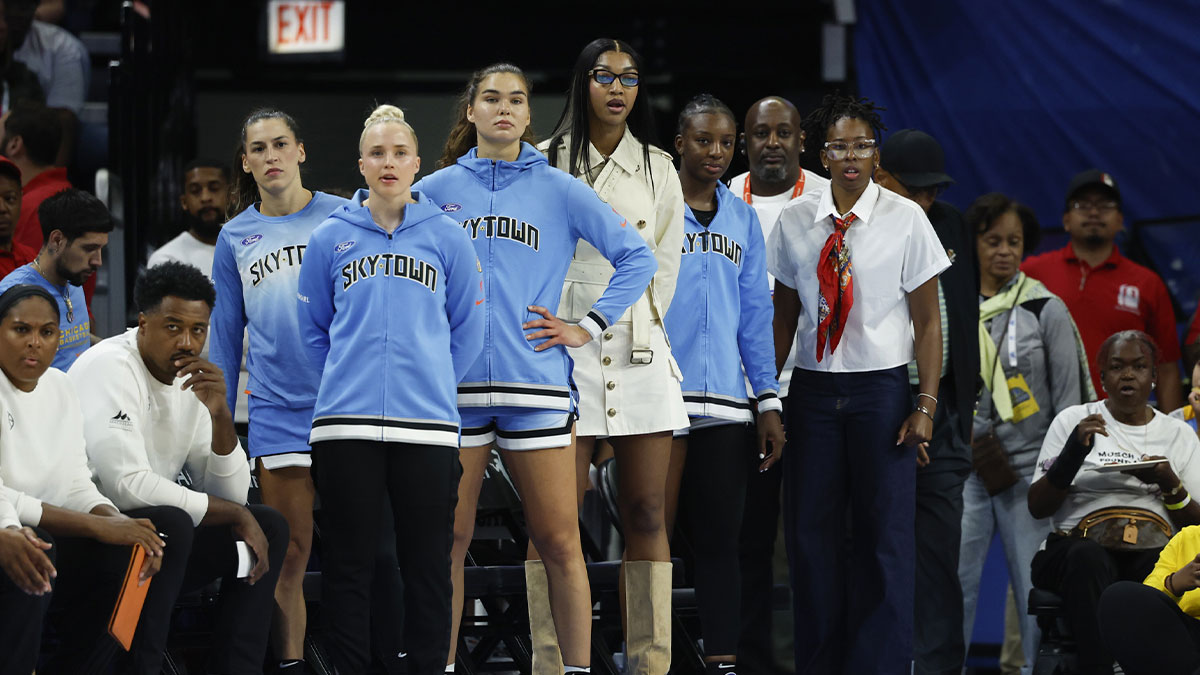 Injured Chicago Sky forward Angel Reese (C) looks on from the bench during the first half of a WNBA game against the Golden State Valkyries at Wintrust Arena.