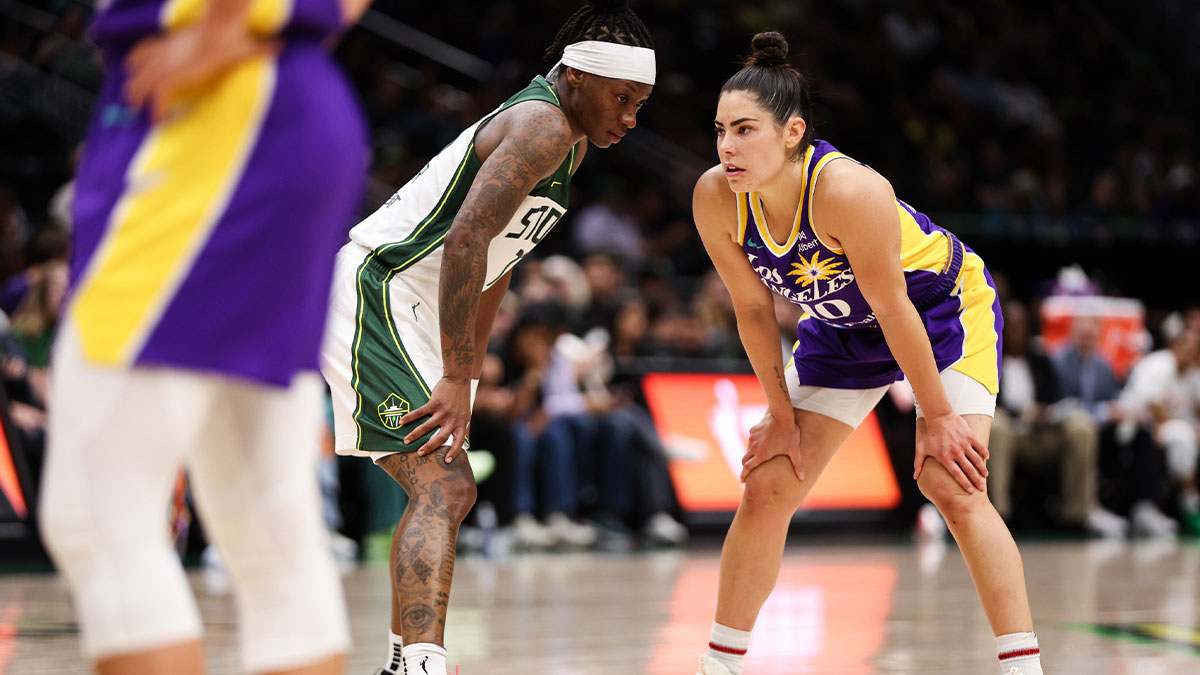 Los Angeles Sparks guard Kelsey Plum (10) and Seattle Storm guard Erica Wheeler (17) prepare for game action to start during the second half at Climate Pledge Arena.
