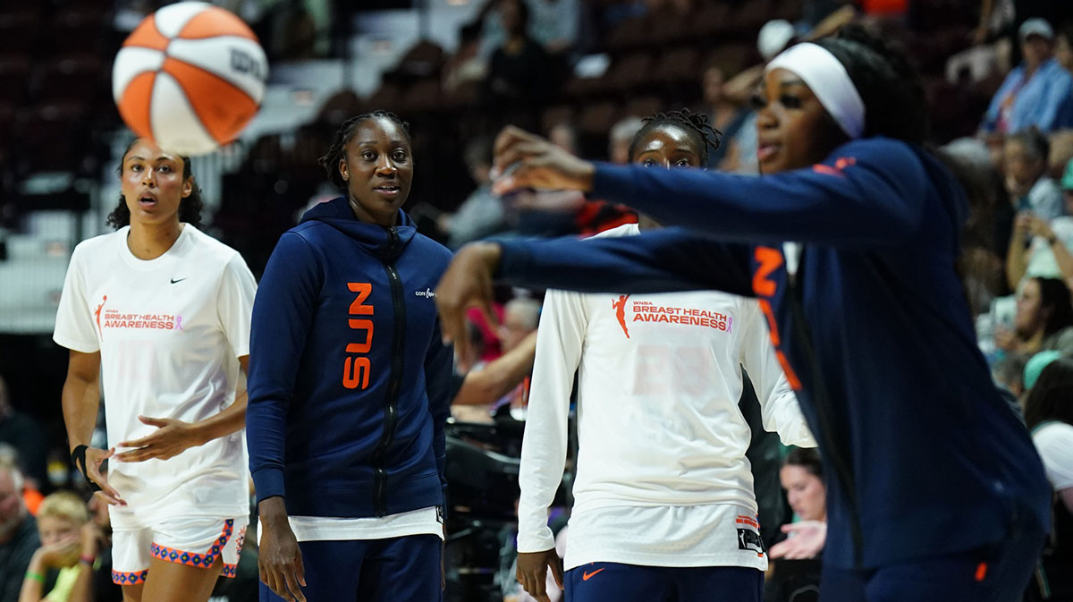 Connecticut Sun center Tina Charles (31) and teammates warm up before the start of the game against the New York Liberty at Mohegan Sun Arena.