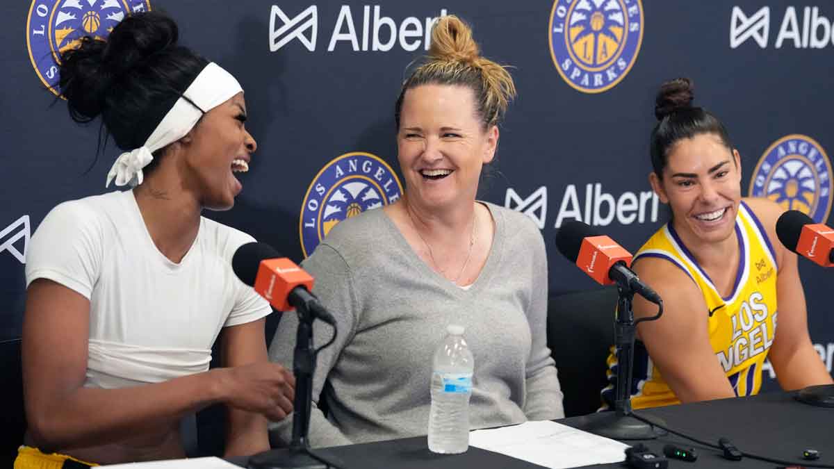 LA Sparks forward Rickea Jackson (left), coach Lynne Roberts (center) and guard Kelsey Plum react at press conference after the game against the Indiana Fever at the Crypto.com Arena.