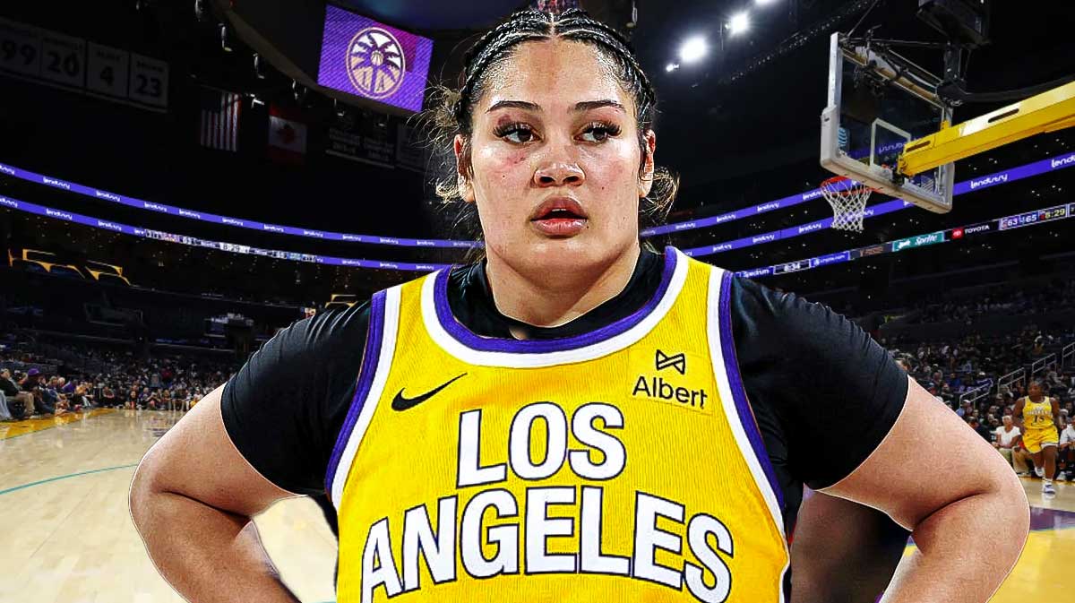 WNBA Alissa Pili in a LA Sparks jersey with the LA Sparks arena in the background