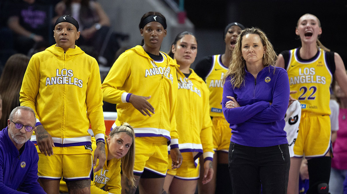 Los Angeles Sparks head coach Lynne Roberts and the bench watch their team take on the Golden State Valkyries during the second quarter at Chase Center.