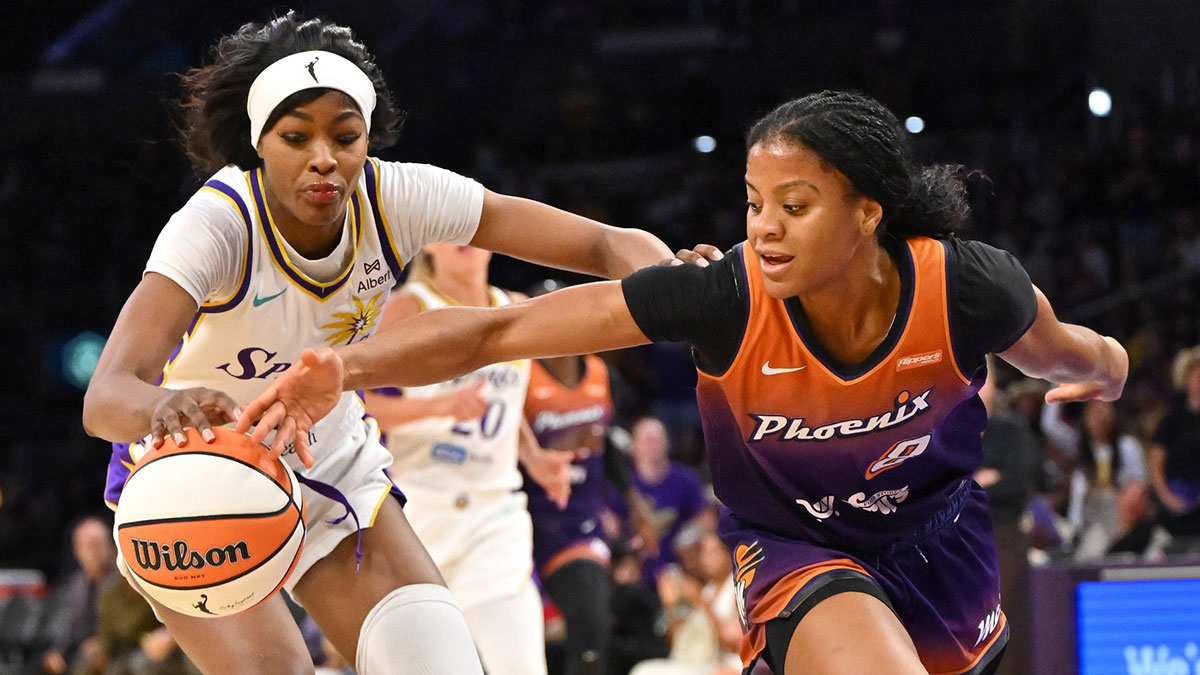 A; Los Angeles Sparks forward Rickea Jackson (2)and Phoenix Mercury guard Monique Akoa Makani (8) reach for a loose ball during the second half at Crypto.com Arena.