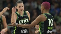 Minnesota Lynx forward Bridget Carleton (6) claps hands with Minnesota Lynx guard Courtney Williams (10) after making a shot against the Indiana Fever in the second half at Target Center.