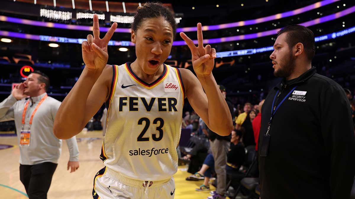 Aug 29, 2025; Los Angeles, California, USA; Indiana Fever guard Aerial Powers (23) celebrates after defeating the Los Angeles Sparks 76-75 at Crypto.com Arena. Mandatory Credit: Kiyoshi Mio-Imagn Images