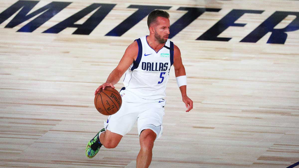 Dallas Mavericks guard J.J. Barea (5) brings the ball upcourt against the Sacramento Kings during the first half of a NBA basketball game in the HP Field House at the ESPN Wide World of Sports Complex.