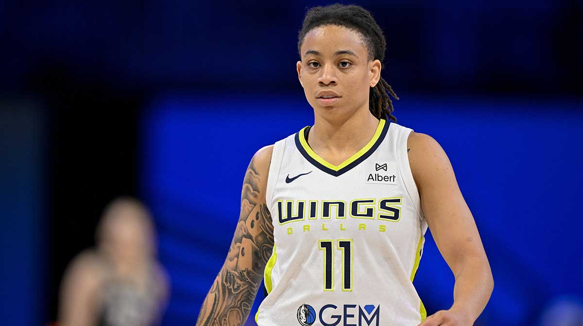 Dallas Wings guard JJ Quinerly (11) in action during the game between the Dallas Wings and the New York Liberty at College Park Center.