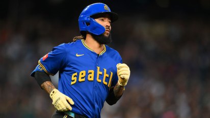 Seattle Mariners shortstop J.P. Crawford (3) runs towards first base after hitting a single against the Tampa Bay Rays during the eighth inning at T-Mobile Park.