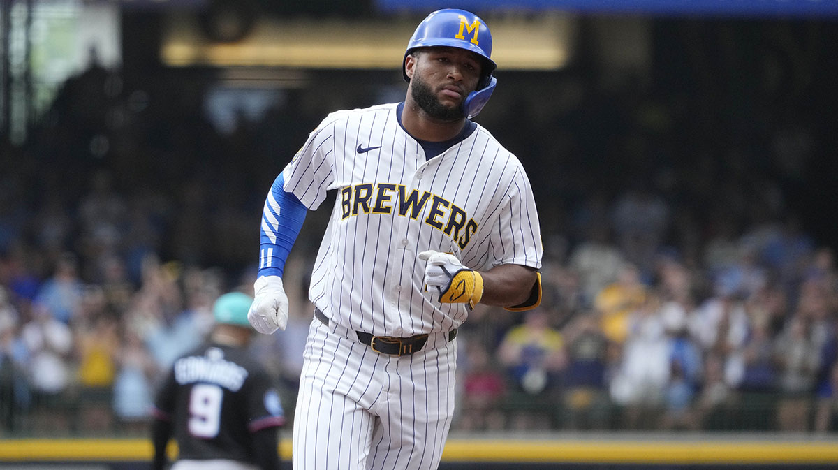 Milwaukee Brewers outfielder Jackson Chourio (11) rounds the bases after hitting a home run against the Miami Marlins in the fourth at American Family Field.