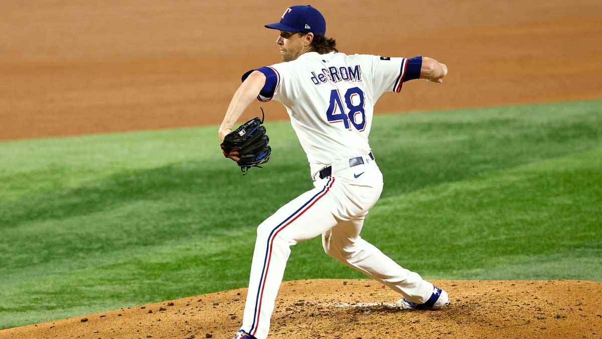 Texas Rangers starting pitcher Jacob deGrom (48) throws during the fourth inning against the Athletics at Globe Life Field.