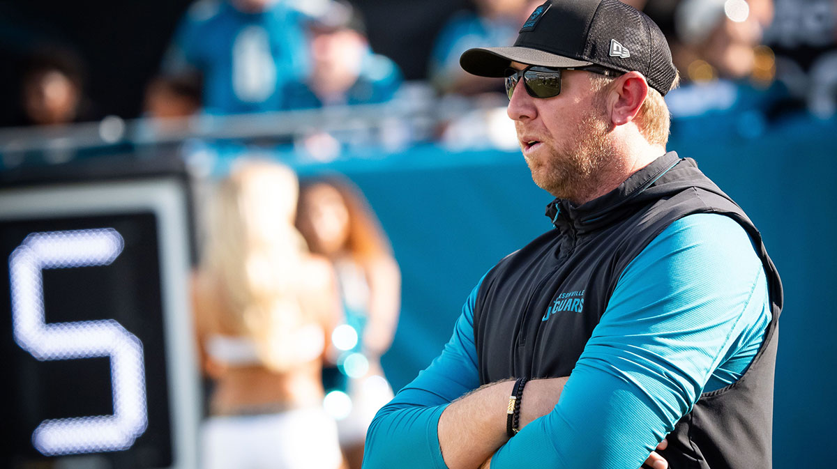 Jacksonville Jaguars head coach Liam Coen watches his team warm up before an NFL scrimmage at EverBank Stadium Friday August 1, 2025, in Jacksonville, Fla.