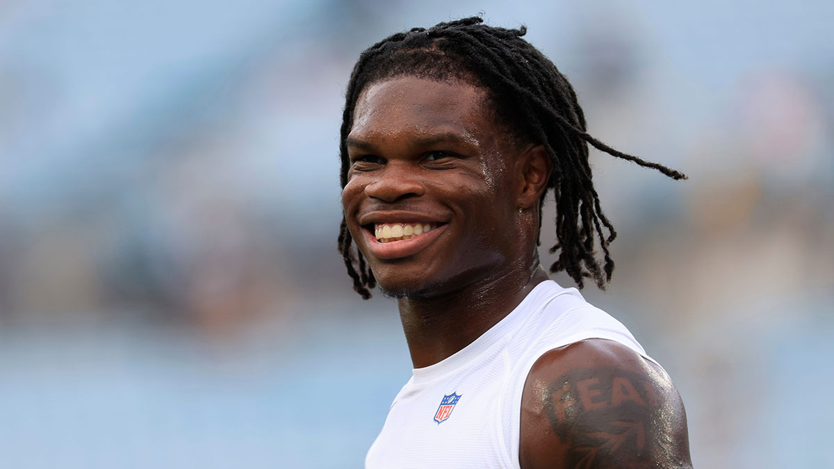 Jacksonville Jaguars wide receiver Travis Hunter (12) smiles before an NFL preseason matchup at EverBank Stadium,