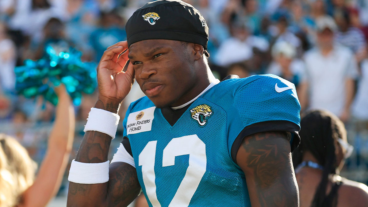 Jacksonville Jaguars wide receiver Travis Hunter (12) walks on the field during an NFL scrimmage event at EverBank Stadium, Friday, Aug. 1, 2025, in Jacksonville, Fla.