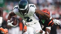 Philadelphia Eagles wide receiver Jahan Dotson (2) runs with the ball against Cincinnati Bengals safety Jordan Battle (27) after a catch during the first quarter at Lincoln Financial Field.