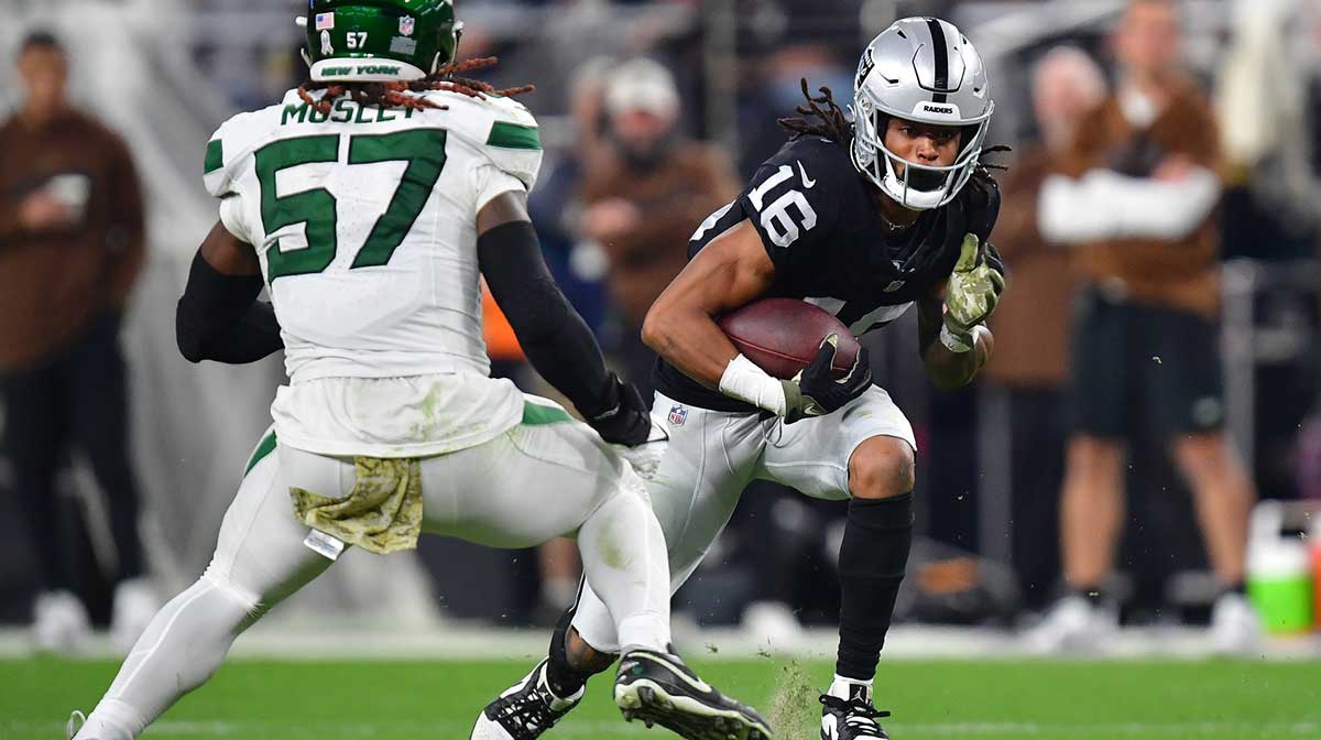 Las Vegas Raiders wide receiver Jakobi Meyers (16) runs the ball against New York Jets linebacker C.J. Mosley (57) during the second half at Allegiant Stadium.