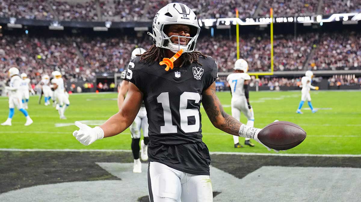 Las Vegas Raiders wide receiver Jakobi Meyers (16) celebrates after scoring a touchdown against the Los Angeles Chargers during the second quarter at Allegiant Stadium.