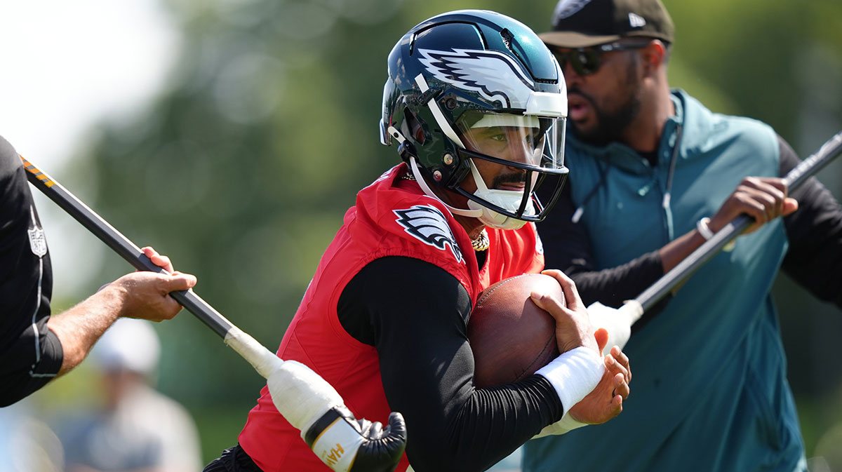 Philadelphia Eagles quarterback Jalen Hurts (1) runs a practice drill during training camp at NovaCare Complex.