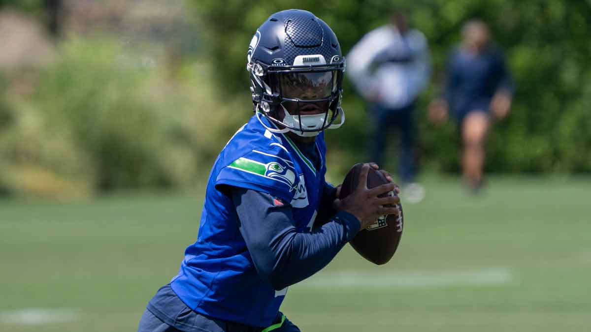 Seattle Seahawks quarterback Jalen Milroe (6) scrambles during mini-camp
