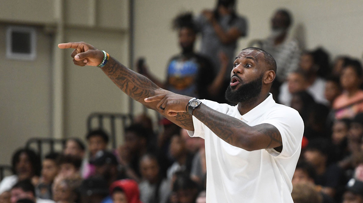 NBA star LeBron James coaches Strive for Greatness during the Strive for Greatness and Mokan Elite basketball game at the fourth day of the Nike Peach Jam at Riverview Park Activities Center.