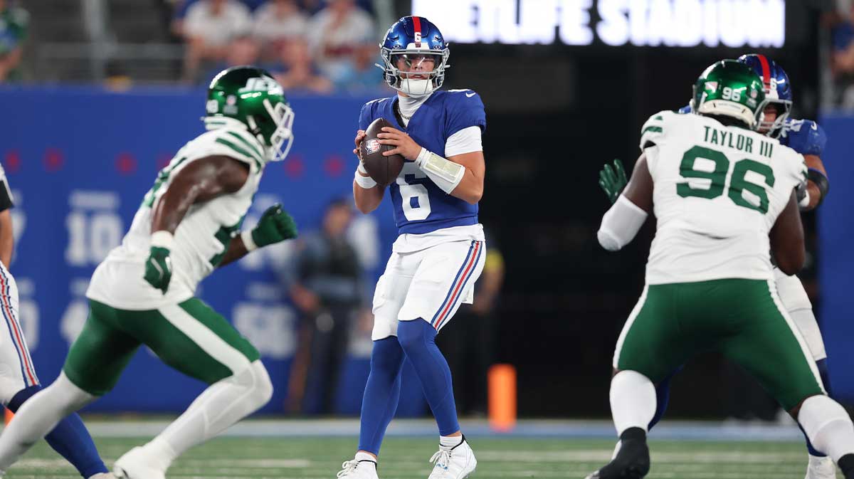 Aug 16, 2025; East Rutherford, New Jersey, USA; New York Giants quarterback Jaxson Dart (6) drops back to pass during the first half against the New York Jets at MetLife Stadium. 