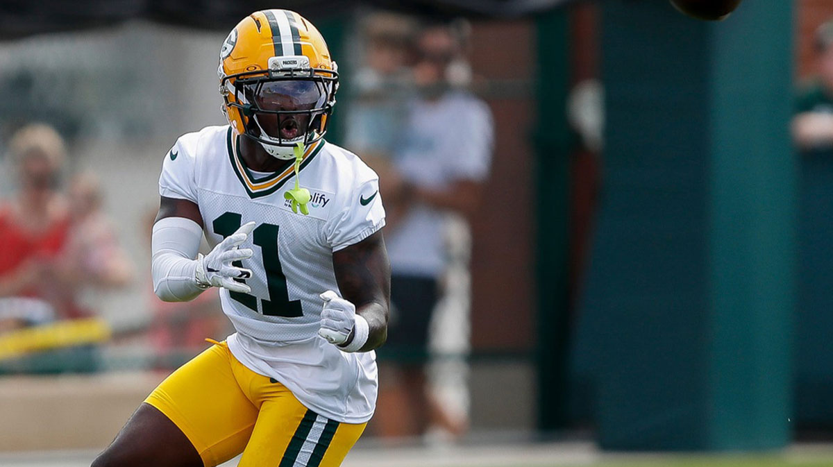 Green Bay Packers wide receiver Jayden Reed (11) catches a pass during the first day of training camp