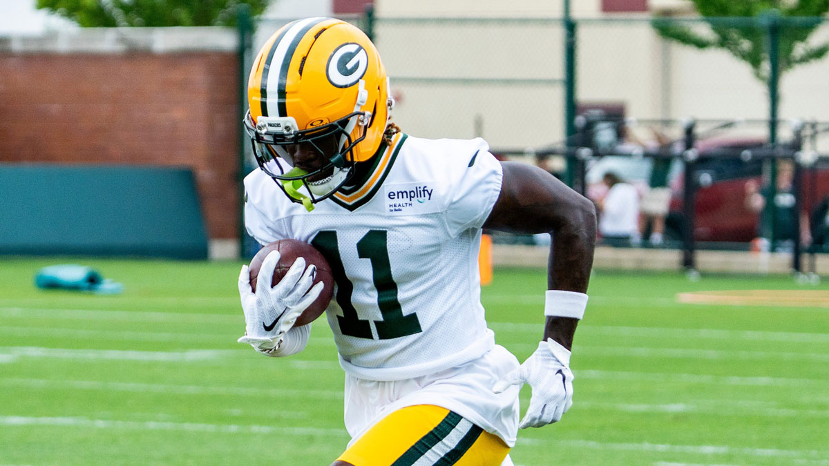 Green Bay Packers wide receiver Jayden Reed (11) runs through a drill during the second day of training camp on Thursday, July 24, 2025, at Ray Nitschke Field in Ashwaubenon, Wis.