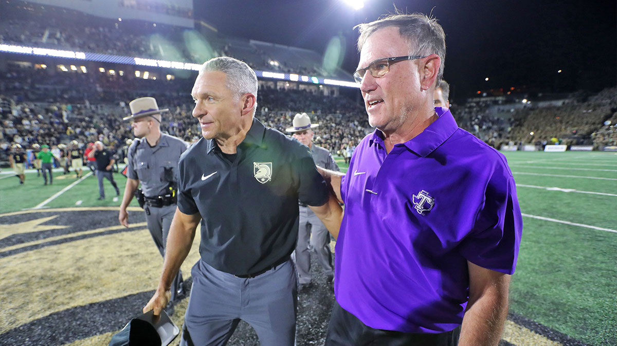 Army Black Knights head coach Jeff Monken congratulates Tarleton State Texans head coach Todd Whitten after the Texans’ double-overtime win at Michie Stadium.