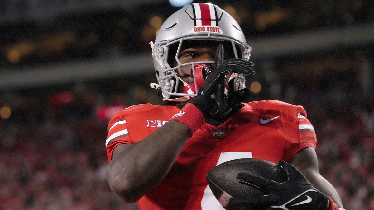 Ohio State Buckeyes wide receiver Jeremiah Smith (4) celebrates after scoring a touchdown during the first half of an NCAA Division I football game on Saturday at Ohio Stadium.