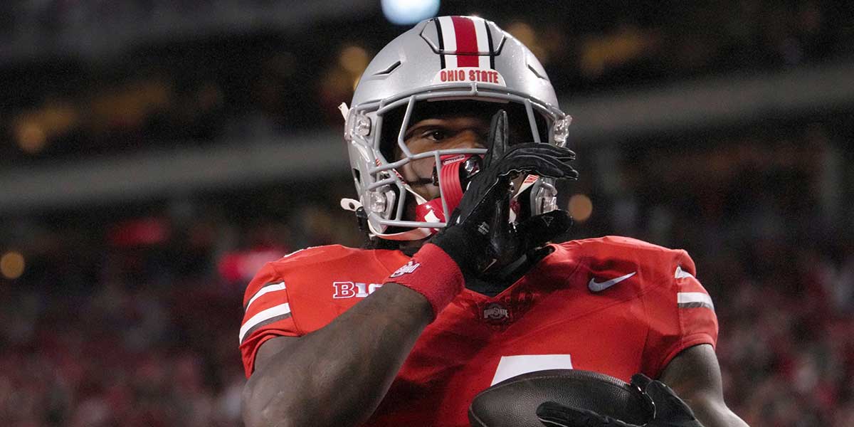 Ohio State Buckeyes wide receiver Jeremiah Smith (4) celebrates after scoring a touchdown during the first half of an NCAA Division I football game on Saturday at Ohio Stadium.